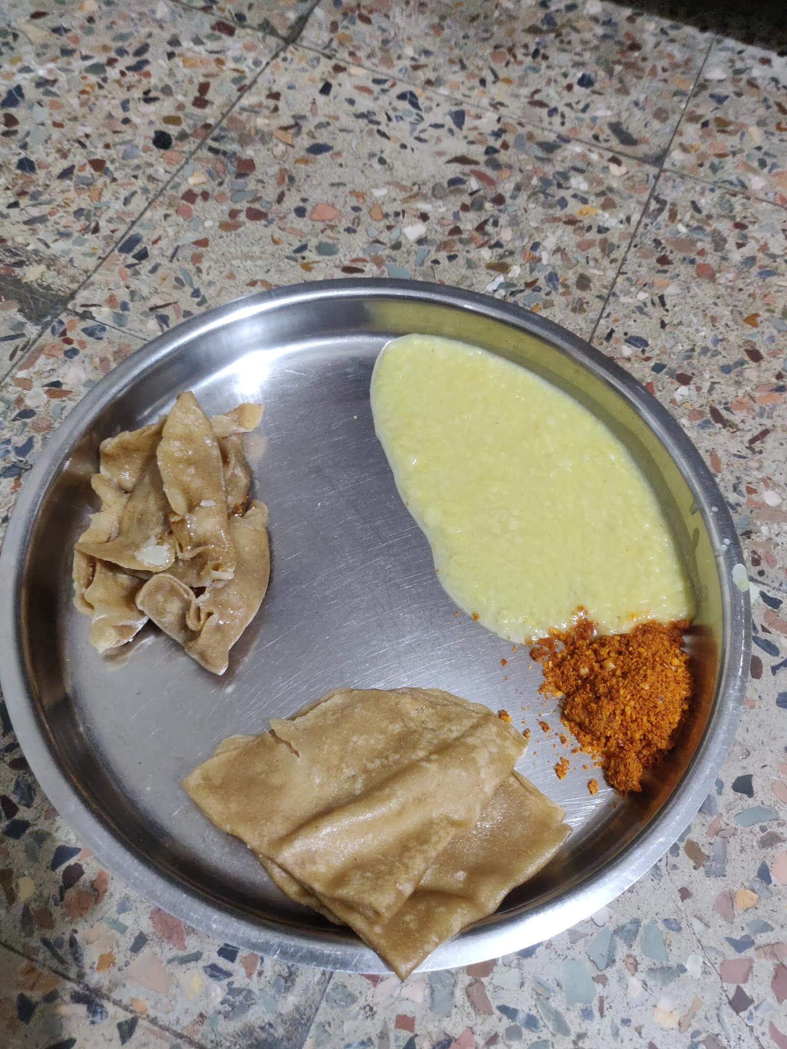 Homemade tiffin meal with chapati and bhaji